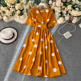 VESTIDO-MIDI-VELVERA-MODELO-MAYA-LARANJA